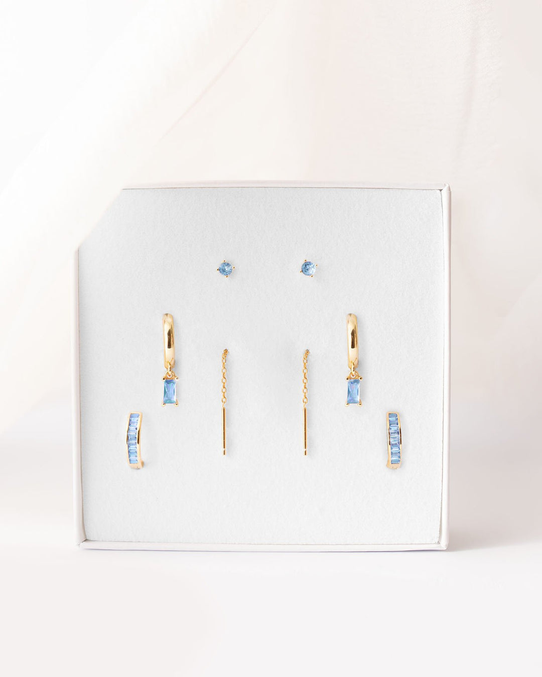 set azzurro placcato oro