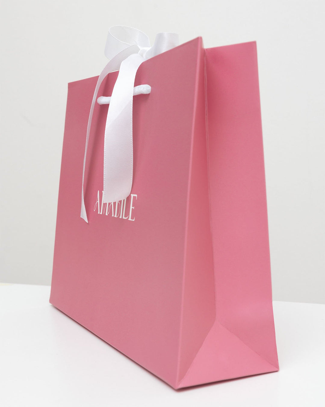 busta rigida rosa di amabile laterale