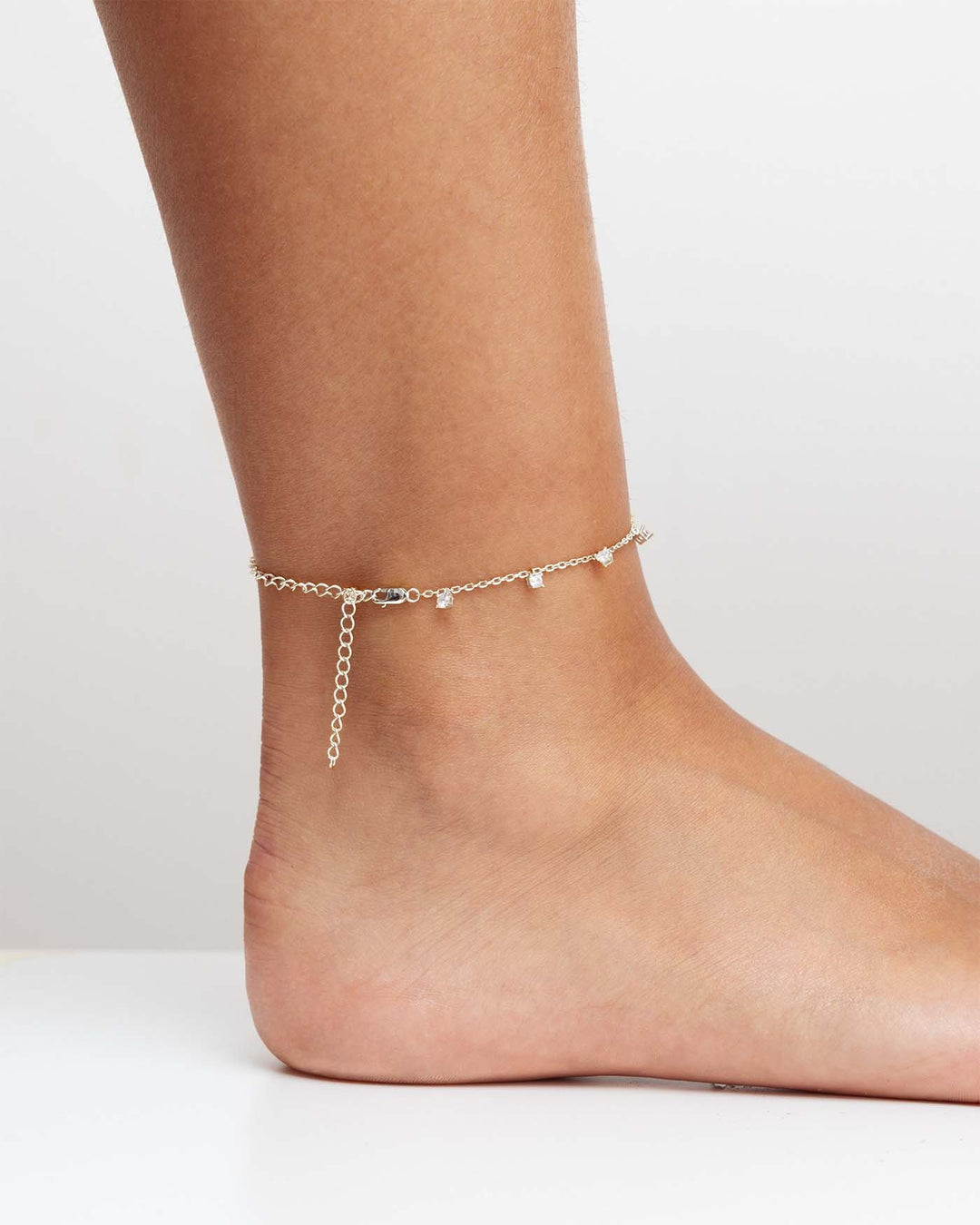 estensore argento applicato su bracciale con pendenti che diventa una cavigliera
