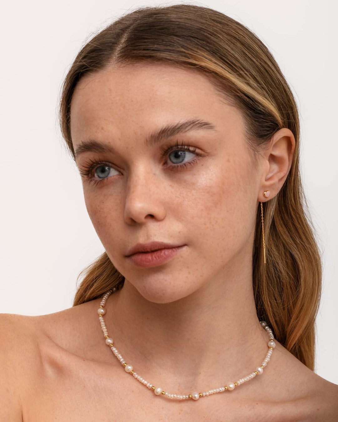 modella indossa set heartbeat oro 