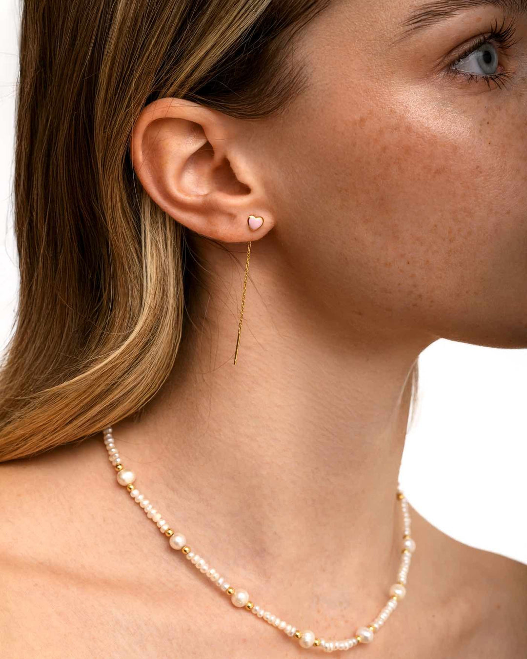 modella indossa set heartbeat oro 