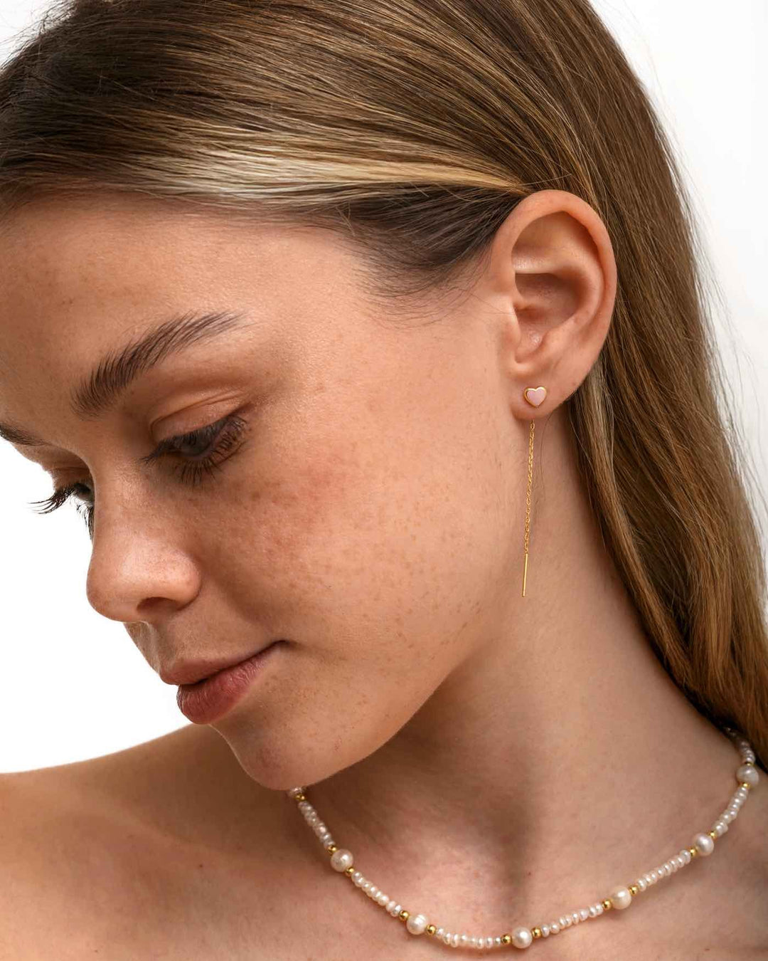 modella indossa set heartbeat oro 